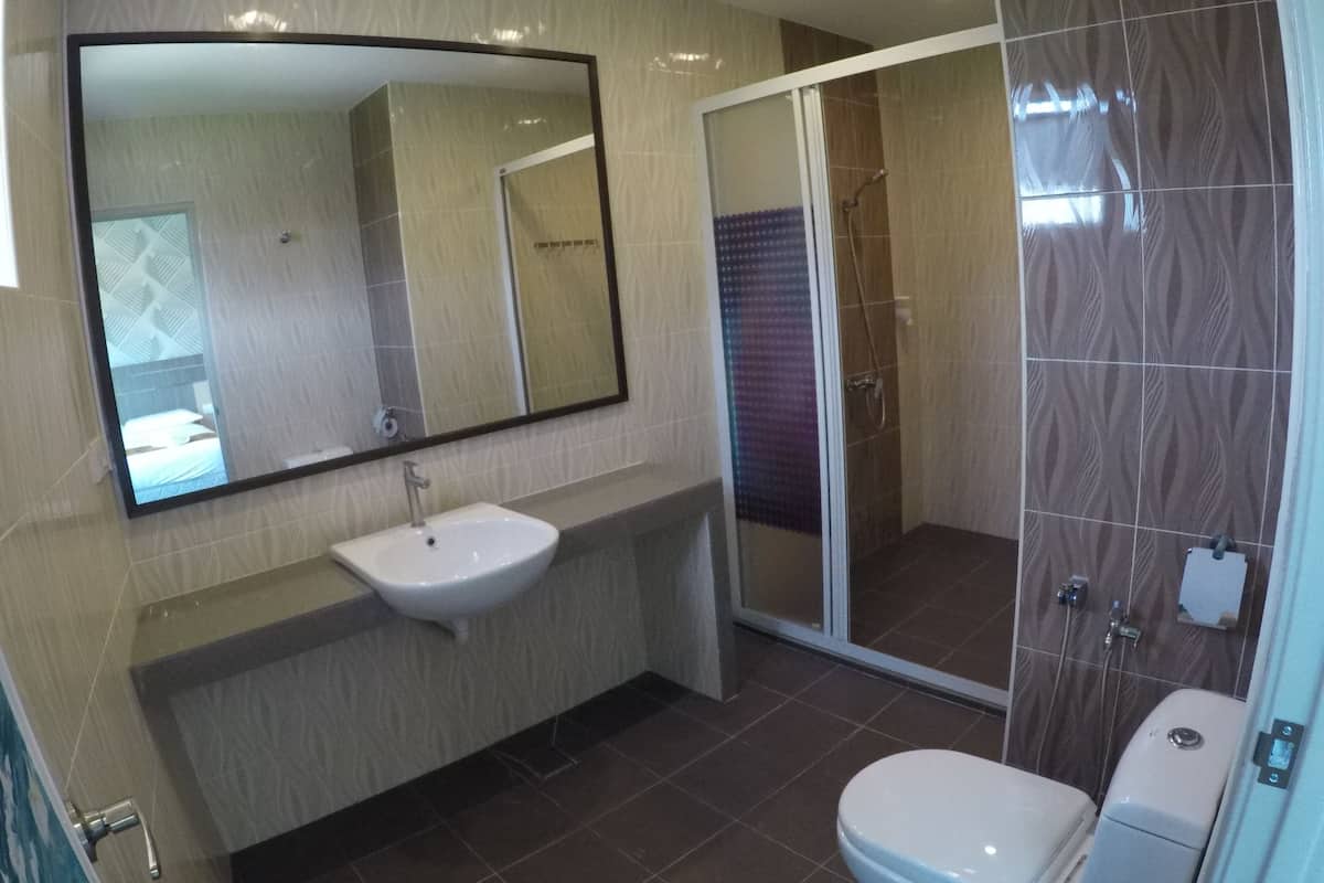 shower, hair dryer, bidet, towels