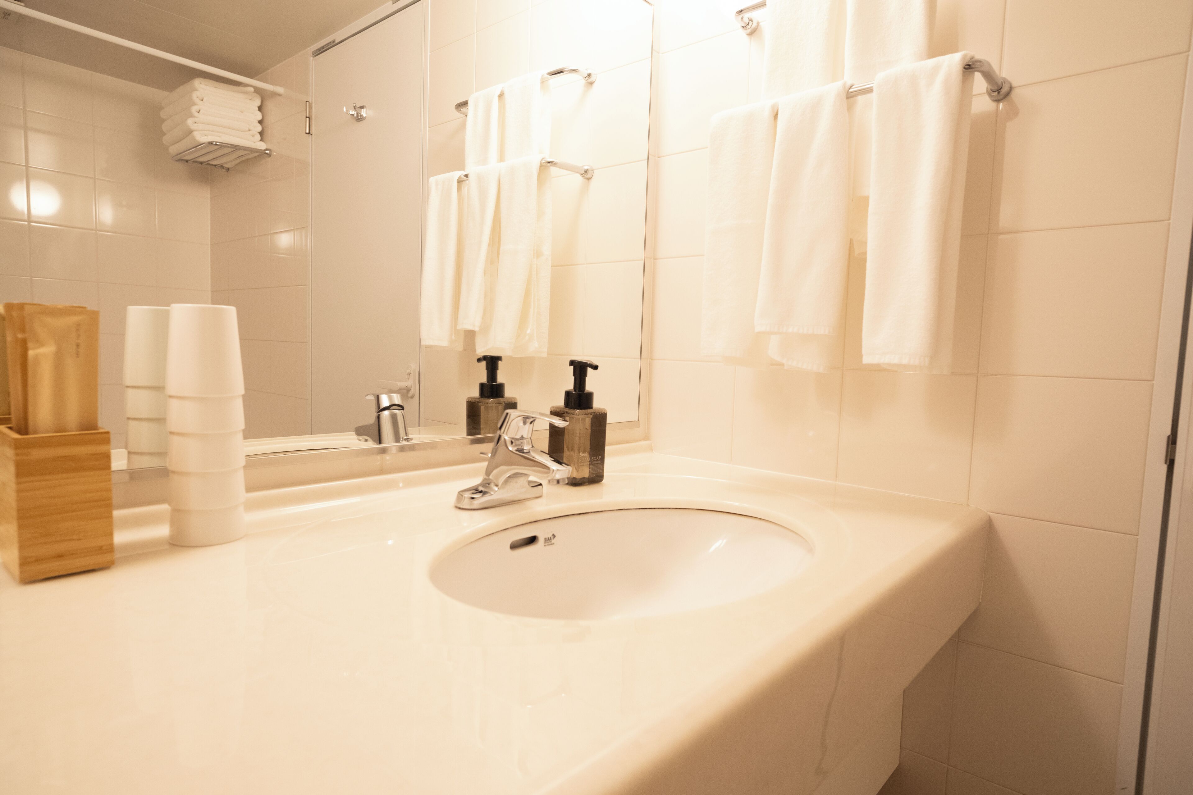 signature suite (non-smoking) | in-room safe, desk, laptop workspace, blackout curtains