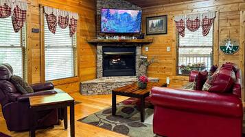 Una televisión, un reproductor de DVD, libros