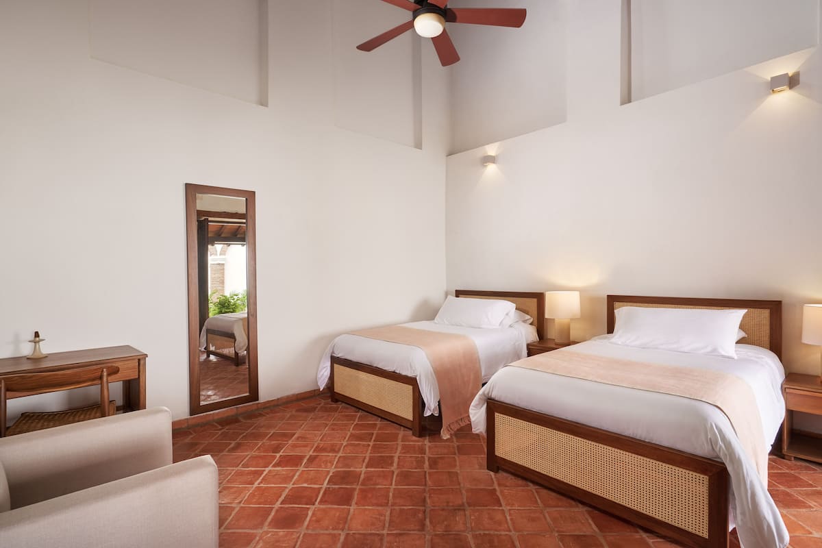 Premium bedding, down duvets, Tempur-Pedic beds, minibar