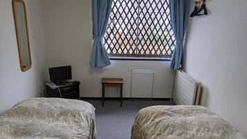 Desk, free WiFi, bed sheets