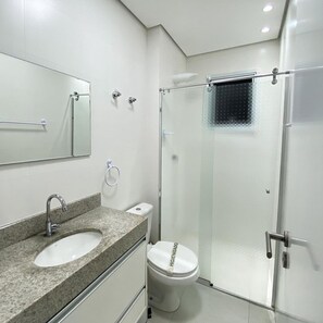 Shower, free toiletries, hair dryer, toilet paper