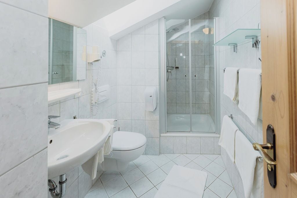 basic quadruple room | bathroom | shower, hair dryer, towels, soap