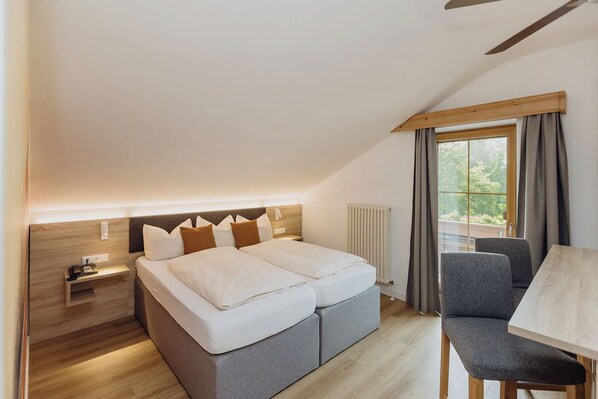 Basic Quadruple Room | Desk, blackout drapes, iron/ironing board, cribs/infant beds