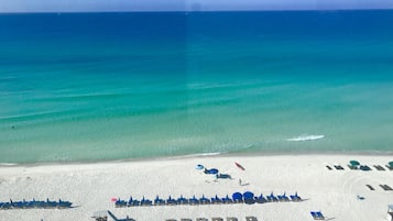 On the beach, sun loungers