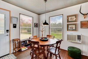 Dining - VINTAGE RIVER CAMP CABIN! Private Medina river and green belt access!   (Bandera)