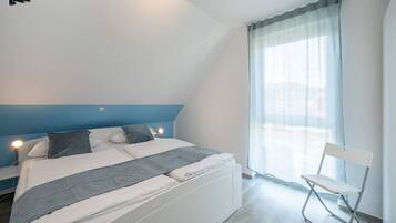 2 slaapkamers, een strijkplank/strijkijzer, gratis wifi