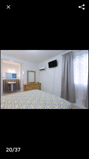 1 غرفة نوم ومكواة/لوح كي وواي فاي وملاءات أسرّة