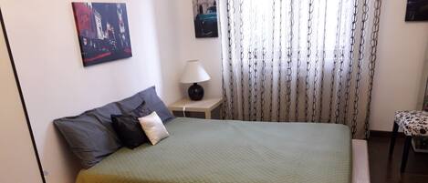 2 bedrooms, desk, iron/ironing board, travel crib