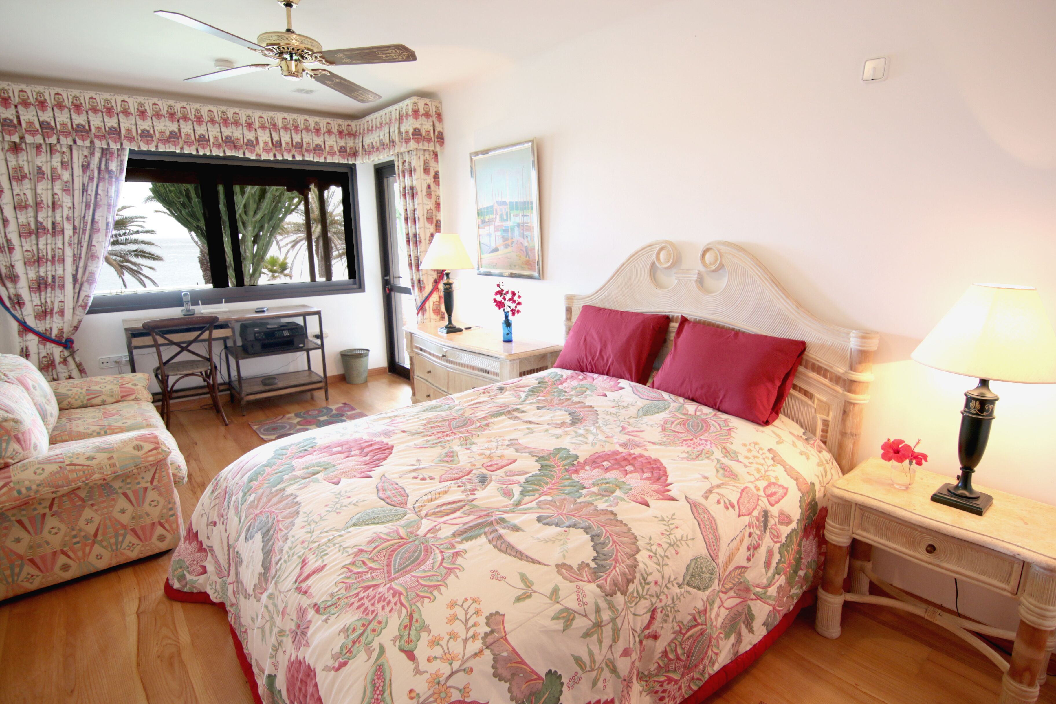 Bedroom #2 with large queen, pull-out sofa and ocean views
