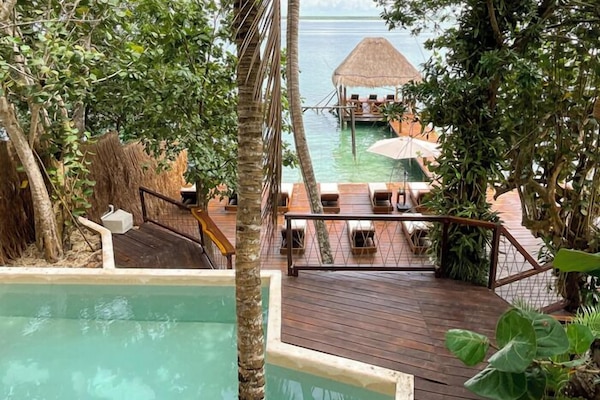 Outdoor pool, open 8:00 AM to 8:00 PM, pool umbrellas