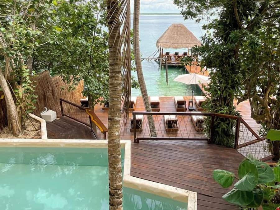 Outdoor pool, open 8:00 AM to 8:00 PM, pool umbrellas