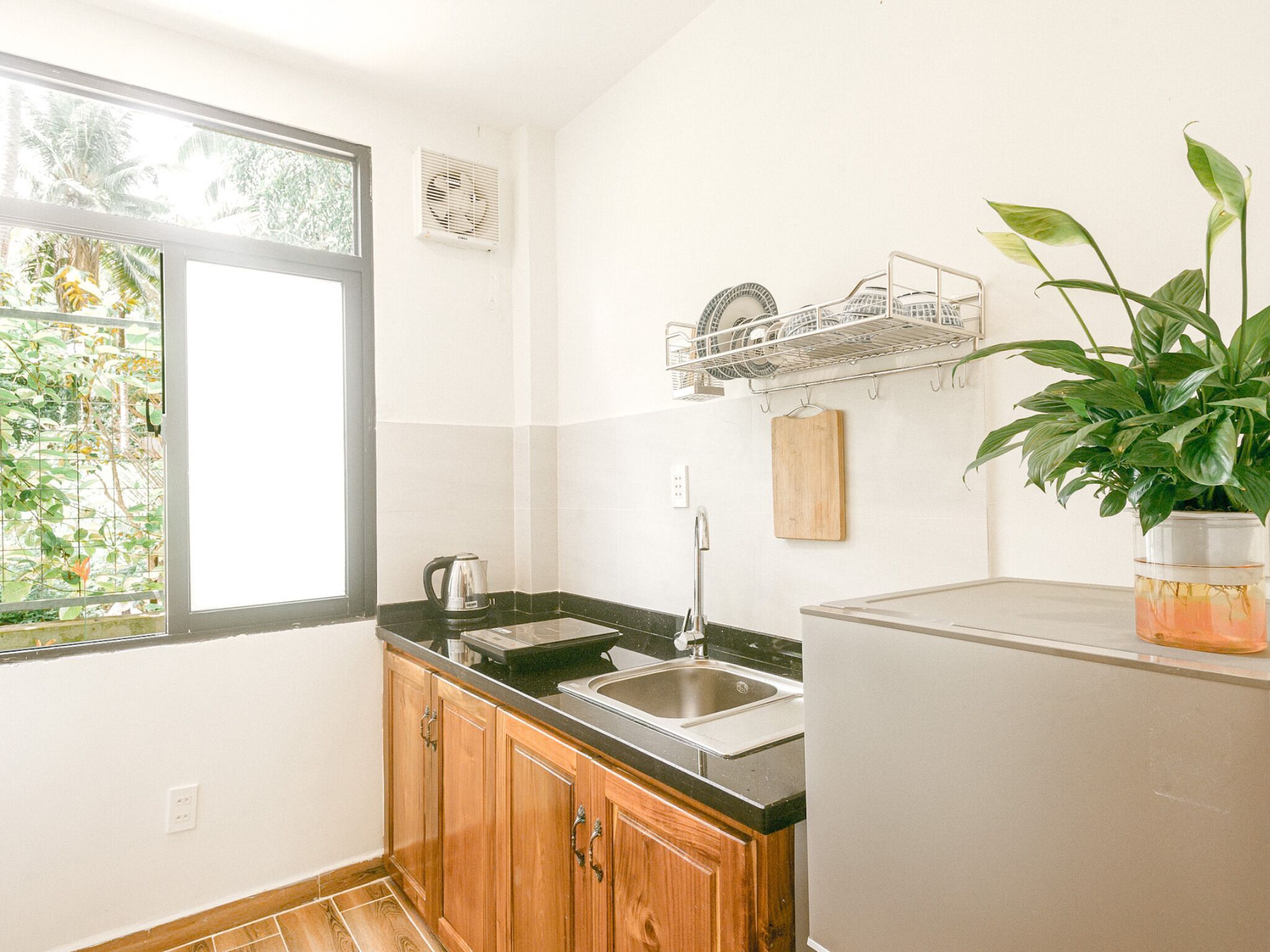 mini-fridge, stovetop, coffee/tea maker, electric kettle