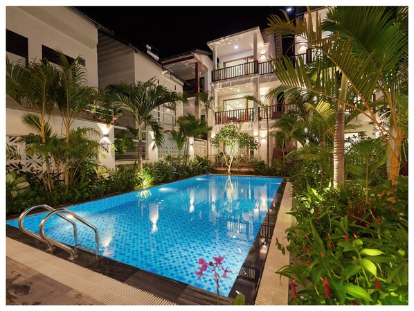 Outdoor pool, open 8:00 AM to 8:00 PM, pool umbrellas, sun loungers