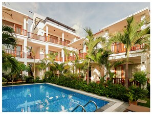 Outdoor pool, open 8:00 AM to 8:00 PM, pool umbrellas, sun loungers