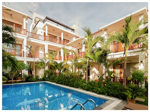 Outdoor pool, open 8:00 AM to 8:00 PM, pool umbrellas, sun loungers