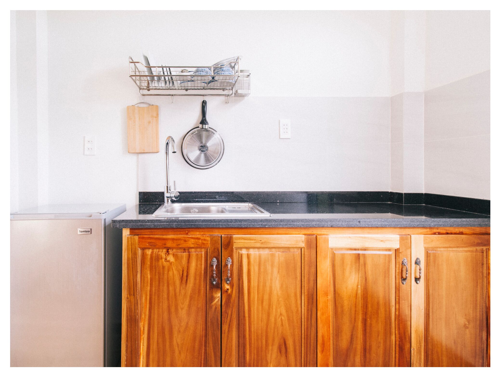 mini-fridge, stovetop, coffee/tea maker, electric kettle