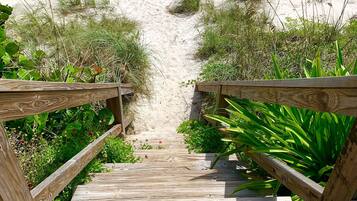 On the beach, sun loungers, beach towels