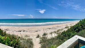 On the beach, sun-loungers, beach towels