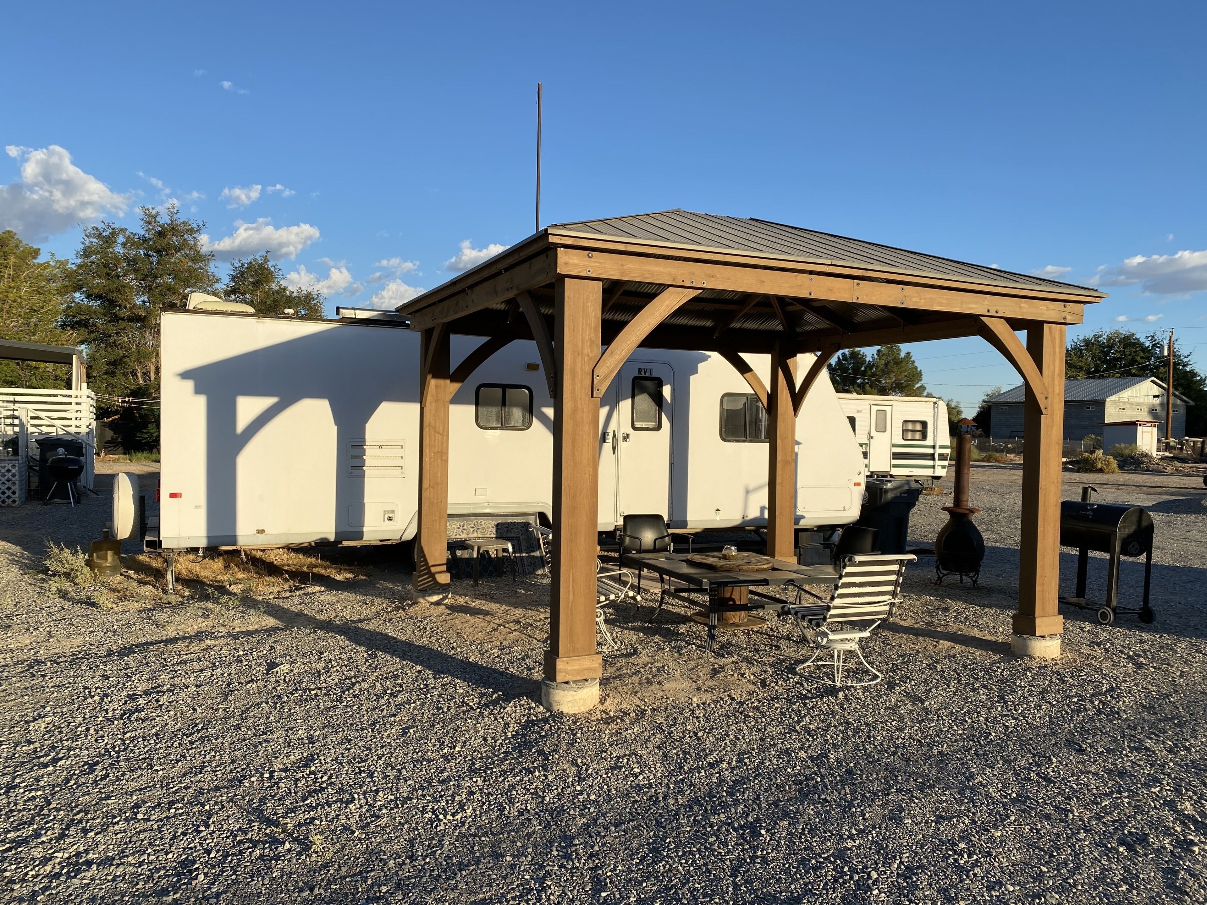 RV1 Camper privacy of your own with 50 amp EV charging outlet available.