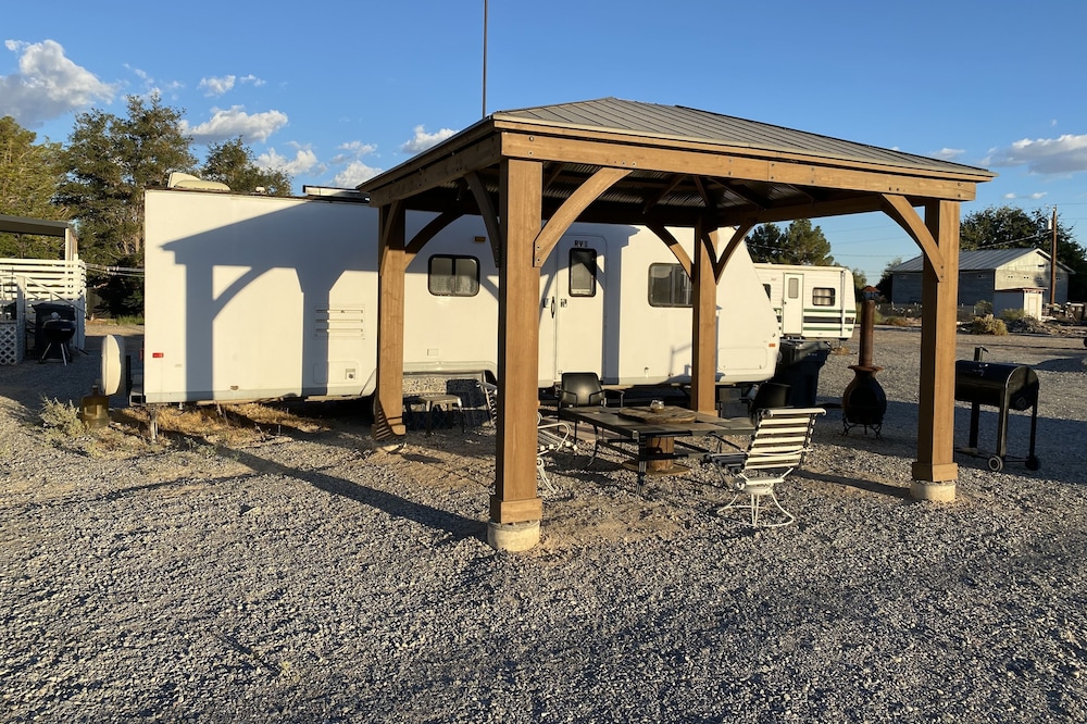 RV1 Camper privacy of your own with 50 amp EV charging outlet available.