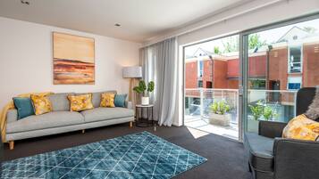 Premium Apartment | Living area | Flat-screen TV