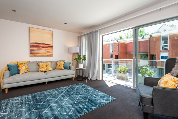 Appartement Premium | Coin séjour | Télévision à écran plat