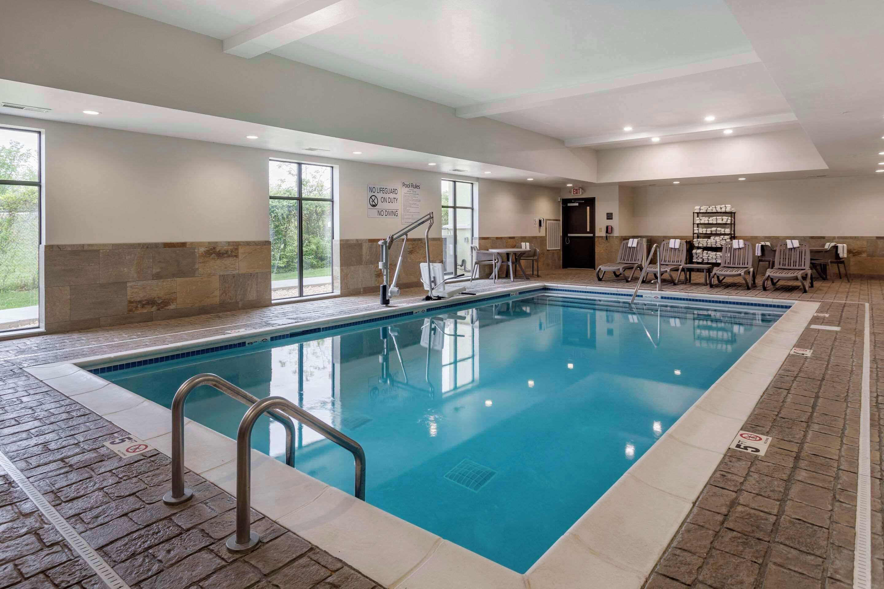 indoor pool, open 7:00 am to 10:00 pm, pool loungers