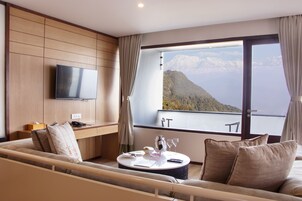 Luxury Suite, Balcony, Mountain View | Premium bedding, minibar, in-room safe, desk