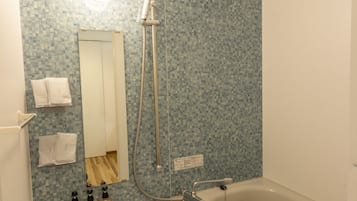 Suite | Bathroom | Shower, free toiletries, hair dryer, slippers
