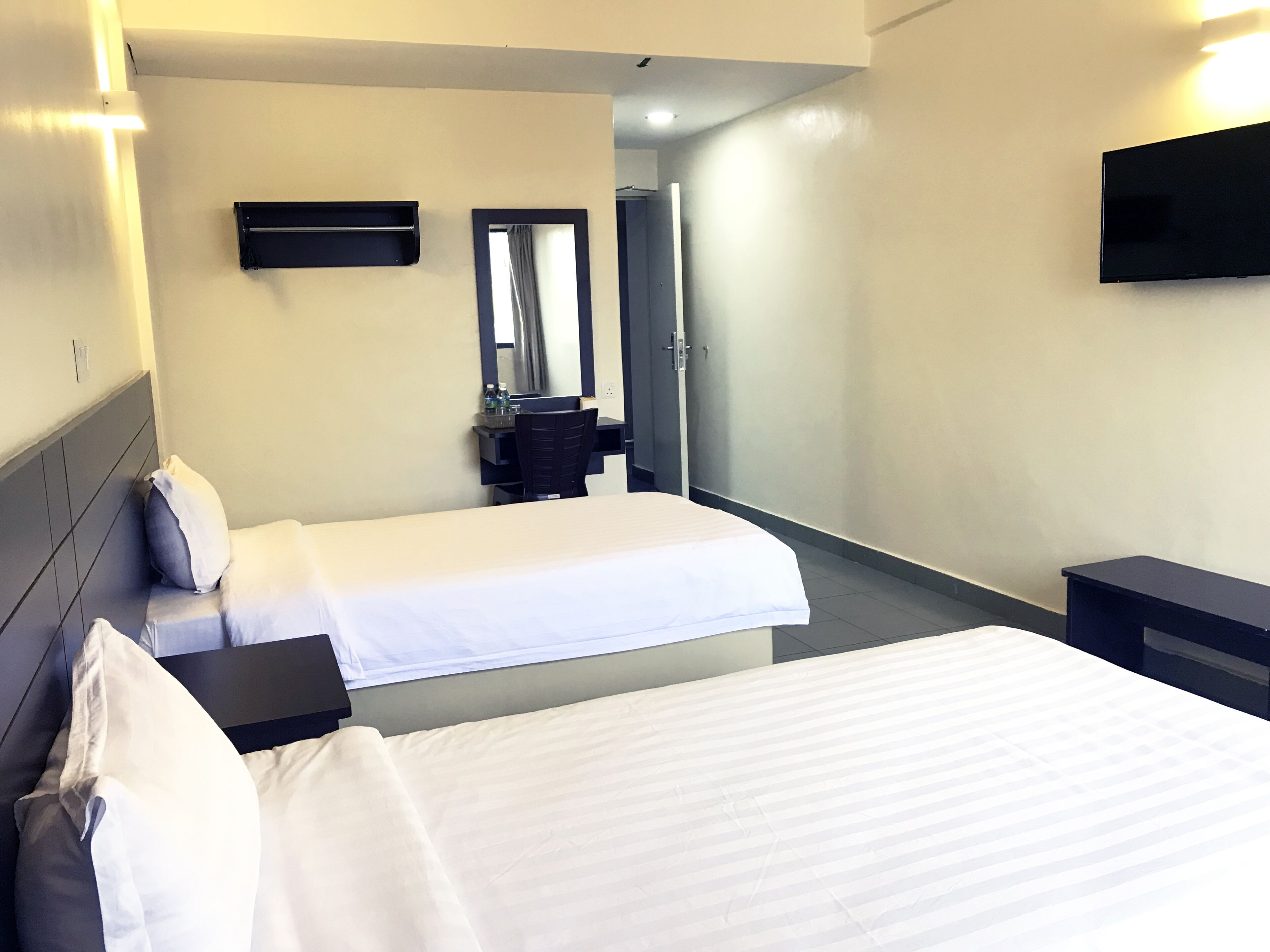 Standard Twin Room | Blackout drapes, iron/ironing board, free WiFi, bed sheets