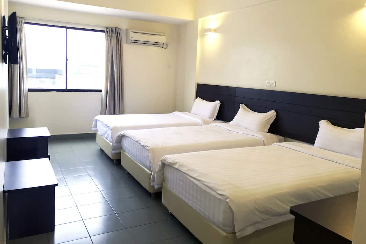 Standard Triple Room | Blackout drapes, iron/ironing board, WiFi (free), bed sheets
