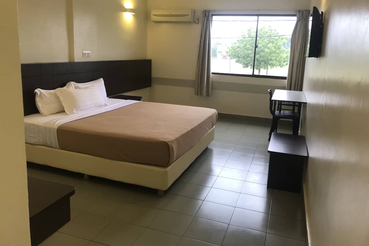 Standard Double Room | Blackout drapes, iron/ironing board, WiFi (free), bed sheets