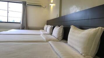 Blackout drapes, iron/ironing board, free WiFi, bed sheets