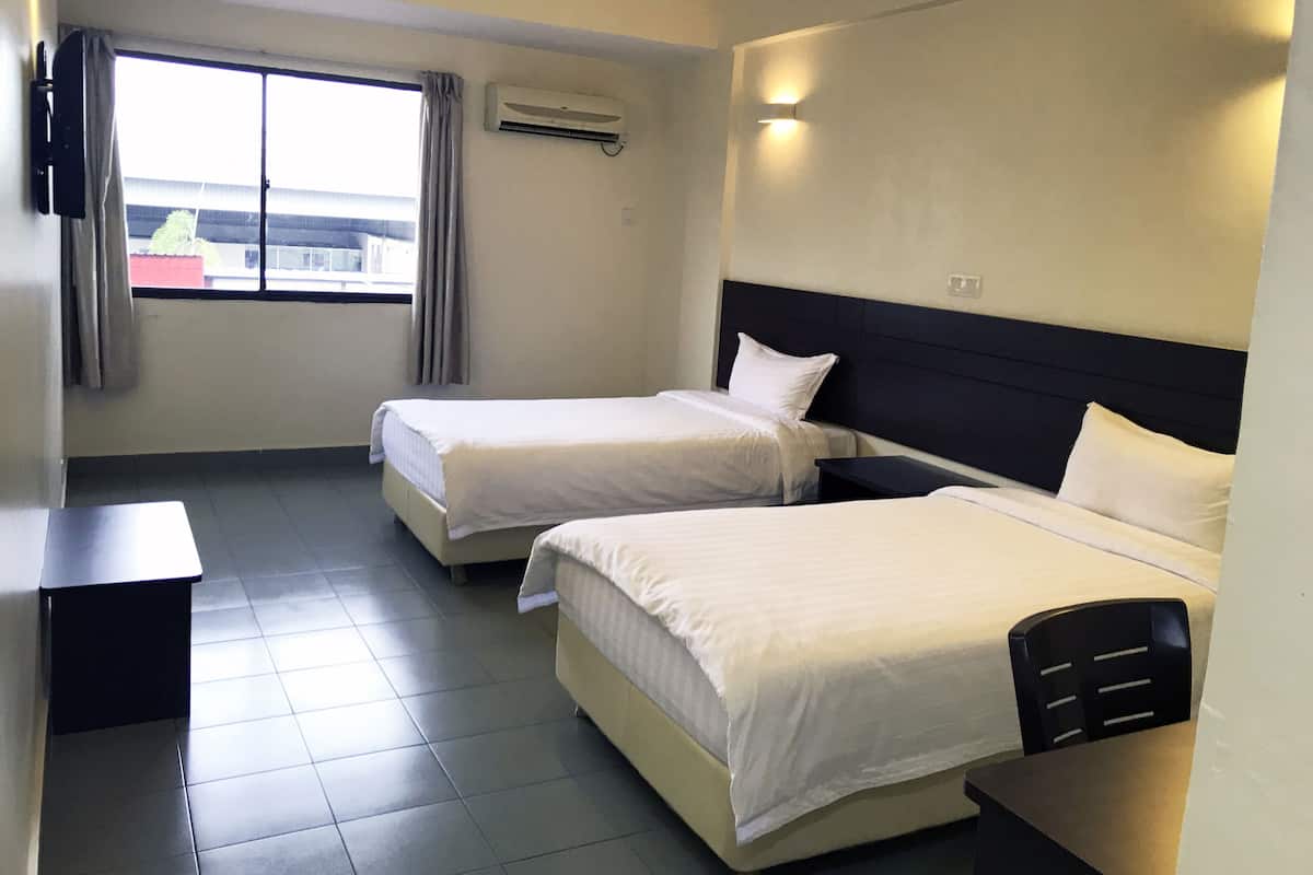 Standard Twin Room | Blackout drapes, iron/ironing board, WiFi (free), bed sheets