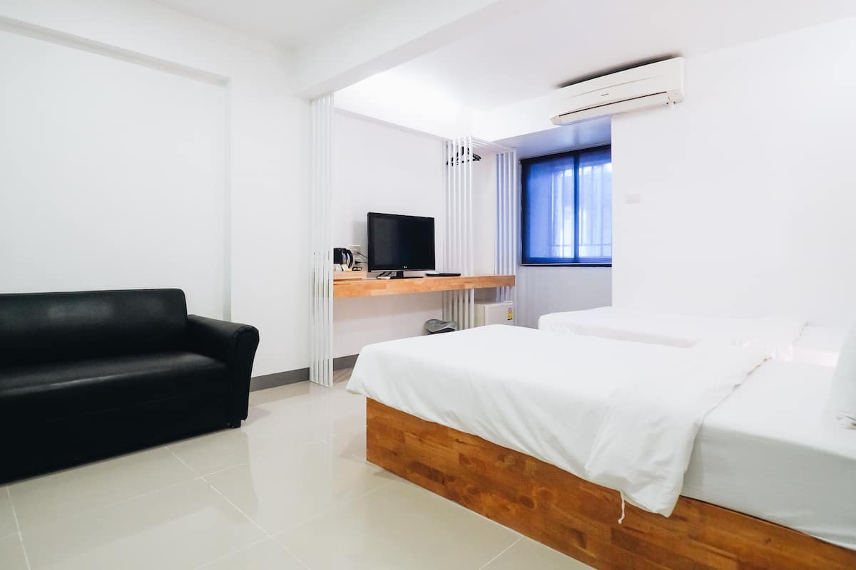 Habitación estándar con 2 camas individuales | Cortinas opacas, tabla de planchar con plancha, wifi gratis