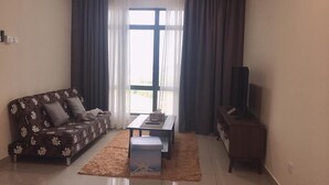 Appartement Deluxe, 2 chambres | Salle de séjour