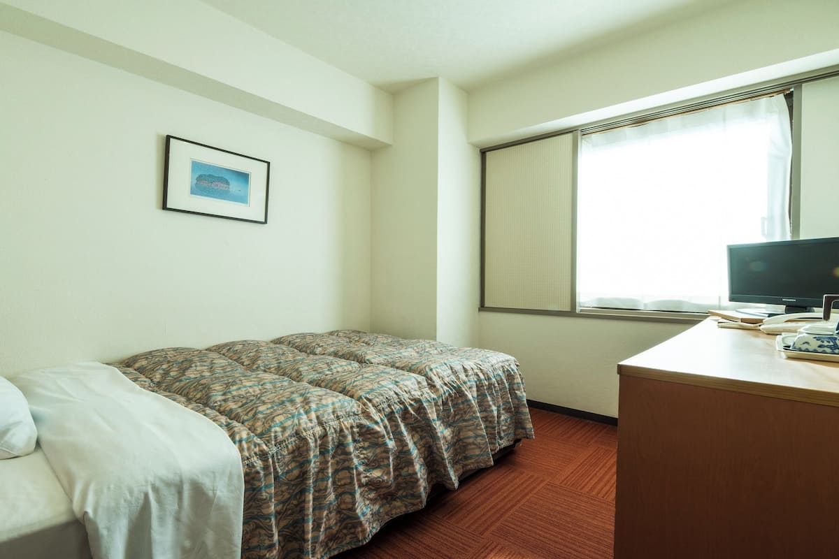 Desk, WiFi (free), bed sheets