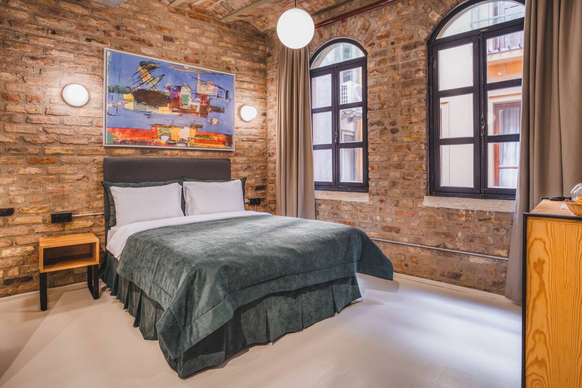 Family Quadruple Room, Non Smoking | Premium bedding, minibar, in-room safe, desk