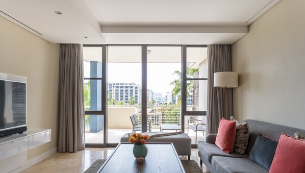 Apartment | Living room | 55-inch Smart TV with satellite channels, TV, Netflix - 308 Juliette on the Waterfront Marina (Cape Town)