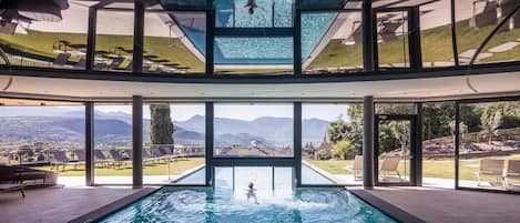 Indoor pool, outdoor pool, pool umbrellas, pool loungers