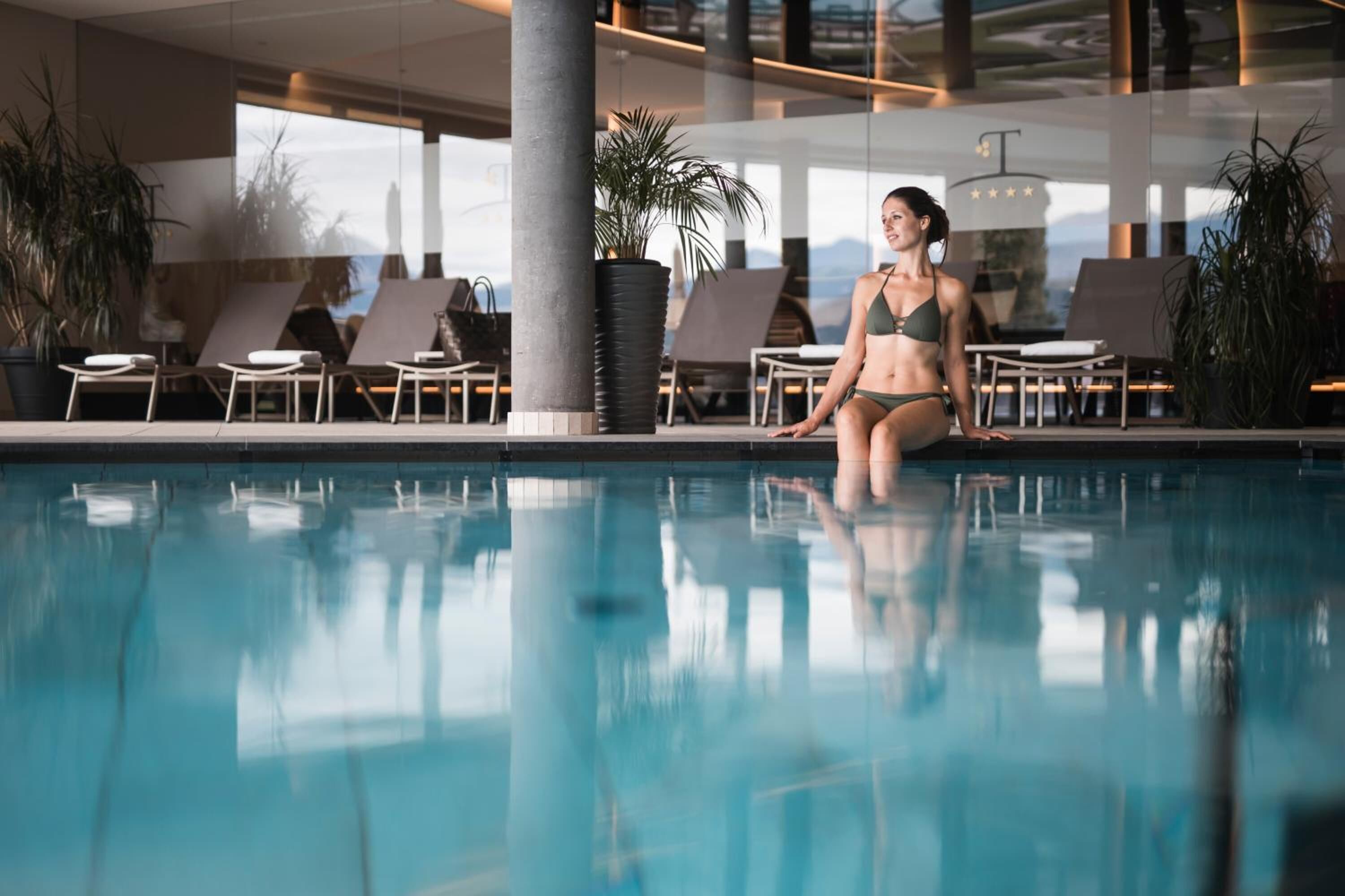 Indoor pool, outdoor pool, pool umbrellas, pool loungers