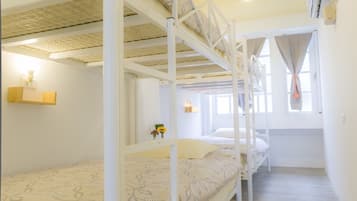 Economy Shared Dormitory, Women only (4 Beds) | Blackout drapes, free WiFi, bed sheets