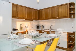 Apartment | Private kitchen | Full-size fridge, oven, stovetop, dishwasher