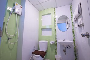 Dusj, håndklær, såpe og sjampo