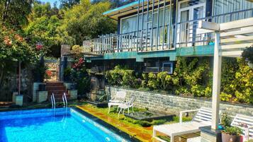Luxury Suite, Mountain View | Outdoor pool | Outdoor pool, pool loungers