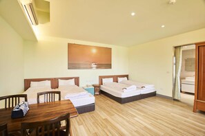 Deluxe Quadruple Room | Premium bedding, individually furnished, desk, laptop workspace - First Shanhai Hotel (Toucheng)