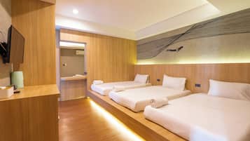 Deluxe Family Room | Blackout curtains, free WiFi, bed sheets