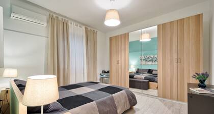 Large apartment between beach and city- With parking and private beach.