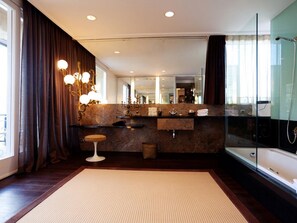 Bathtub, hair dryer, towels